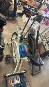 lot 2104 image: Tunturi Stationary Exercise Bike and Ab Roller
