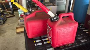 lot 2229 image: 2 Red Gasoline Fuel Cans with Yellow Spouts 5 Gallon 1 Gallon
