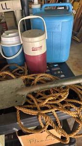 lot 2230 image: Coleman Cooler Lot with 5-Gallon Jug, Beverage Carrier, and Rope with shovel