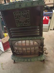 lot 2301 image: Eatate Triple Effect Cast Iron Stove with Decorative Doors.  39 x 28 x 19