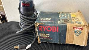 lot 4622 image: RYOBI TR30U Laminate Trimmer with Carbide Trim Bit