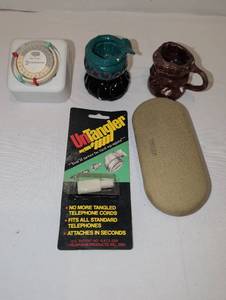 lot 1009 image: Intermatic Time of Day Timer, Untangler Telephone Cord Device, Ceramic Figurines, Cloth Case Lot