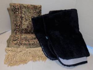 lot 1207 image: One rug with Fringe and two navy bathroom rugs