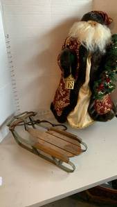 lot 1504 image: Santa Claus Figurine with Wooden Sled