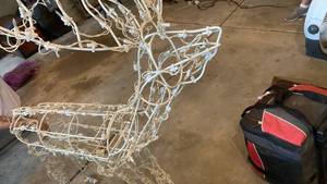 lot 1544 image: White Wire Frame Reindeers Outdoor Decoration with LED Lights