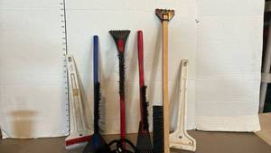 lot 1623 image: Lot of 6 Snow Removal Brushes Scrapers Long Handles Wood Red Blue White and a dog leash