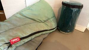 lot 1639 image: Coleman Sleeping Bag with a small sleeping bag in bag
