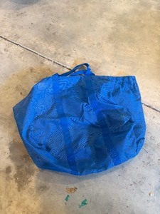 lot 1012 image: Giant mesh bag, needs handle repair