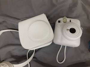 lot 211 image: Fujifilm Instax Mini Instant Camera and Carrying Case - Retail $0