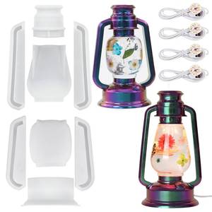 lot 286 image: LANTERNS NOT INCLUDED, MOLDS ONLY Actvty Kerosene Lamp Resin Mold Set, 2 Shapes Lantern Silicone Molds for Resin Casting, Camping Lantern Molds with 4pcs LED Lights DIY Retro Oil Lamps for Table Fireplace Home Decoration - Retail $18