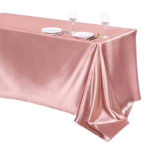 lot 638 image: TURSTIN 1 Pack Rose Gold Satin Tablecloth 102 x 58 Inch Overlay Satin Table Cover Rectangle Bright Silk Tablecloth Smooth Fabric Table Decoration for Wedding Banquet Party Events - Retail $10