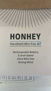 lot 17427 image: Honhey Handheld Mini Fan G7 Rechargeable Battery 3 Level Speed - Retail $15