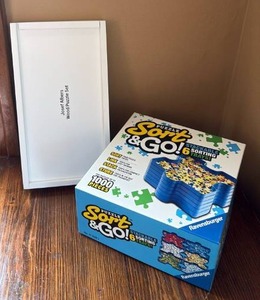 lot 62 image: Ravensburger Puzzle Sort & Go 6 Stackable Sorting Trays 1000 Pieces and Josef Albers Puzzle Set