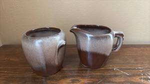 lot 170 image: Brown Glaze Sugar Bowls and Creamer