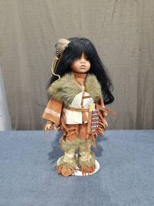lot 2467 image: Porcelain Doll Black Hair Native American Outfit Fur Trim
