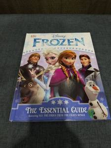 lot 2486 image: DK Disney Frozen The Essential Guide Book with All the Lyrics from the Films Songs