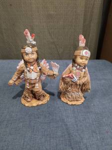 lot 2523 image: Two Native American Figurines with Feather Headdresses and Beaded Clothing