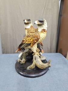 lot 2554 image: Two Eagle Head Figurine on Black Base