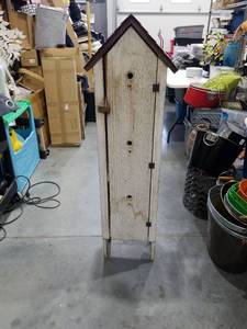 lot 2557 image: Tall Wooden Shelving Cabinet with House-Shaped Top and Dark Trim