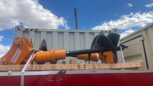 lot 593 image: Auger Attachment Model 305 cat Augers
