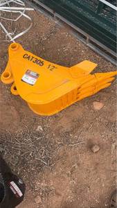 lot 546 image: Cat 305 excavator bucket 12