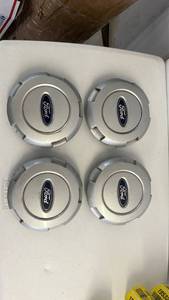 lot 17315 image: Ford Wheel Center Hub Caps Set of 4 ( look used but in good shape- 7 across - see photo) - Retail $25