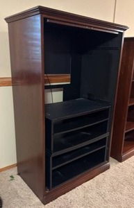 lot 915 image: Entertainment cabinet with shelving 64 x 40 x 24 in (located in basement)