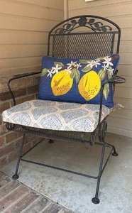 lot 922 image: Wrought iron front porch rocker with cushion and pillow