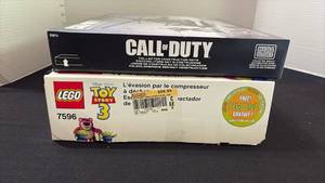 lot 1076 image: Board Game and Toy Story 3 Legos