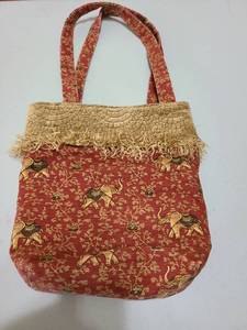 lot 1207 image: Tote Bag Red Gold Elephant Pattern with Fringe Trim