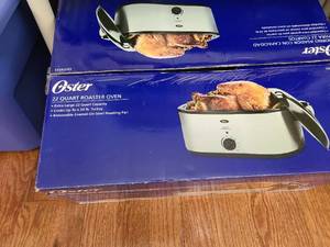 lot 1213 image: Oster 22 Quart Roaster Oven CKSTR523, appears new in box