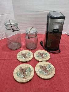 lot 1226 image: Black and Decker coffee grinder, Ball jars with bales and Eagle stone coasters.