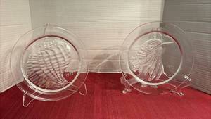 lot 2007 image: Lalique Eagle 1973 and Conch Shell 1972 Glass Plates with Stands