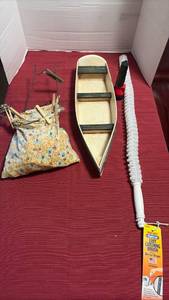 lot 2041 image: Wooden Boat, Flash Light, Lint Catching Brush, and Flashlight