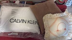 lot 2108 image: Calvin Klein Bed Pillow and Throw Pillows