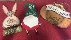 lot 2135 image: Hanging Wooden Holiday Signs
