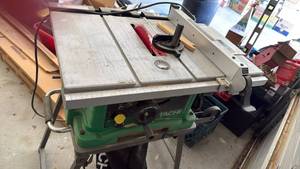 lot 3000 image: Hitachi table saw with stand