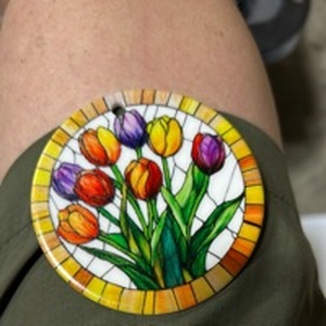 lot 63389 image: Stained Glass Style Tulip Round Ornament - Retail $8
