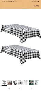 lot 23264 image: Hiasan Buffalo Plaid Tablecloth Waterproof, 2 Pack, 60 x 84 inch - Black and White Checkered Table Cloths Rectangle for Outdoor PicnicPartyDining - Retail $0