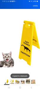 lot 23303 image: Mini Cat Vomit Sign - Perfect Gag Gift for Cat Lovers and Humor Enthusiasts(Cat Vomit Sign) - Retail $0