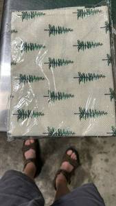 lot 32163 image: Burlap Pine Tree Print Placemat or Small Mat - Retail $8