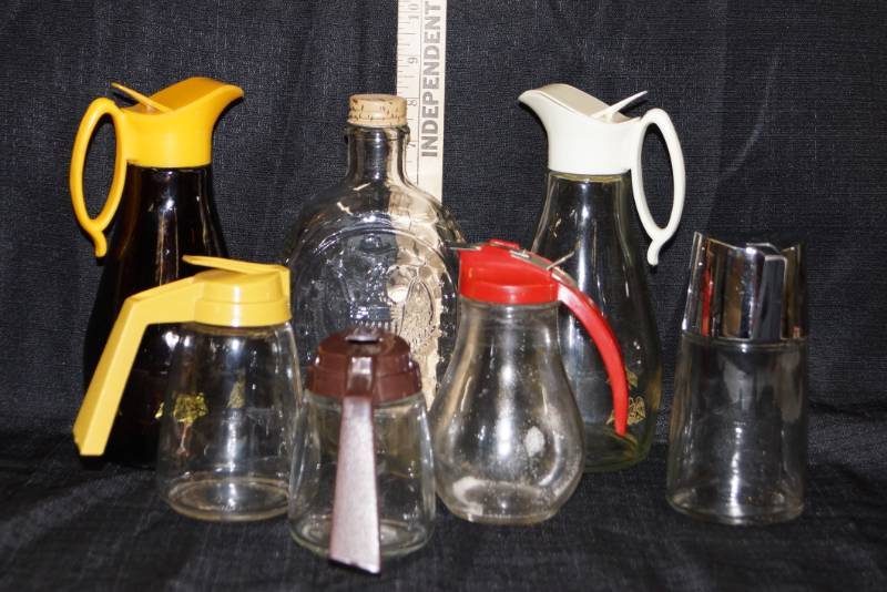 lot 384 image: LOOK ( ) Lot of 7 Vintage Syrup Bottles
