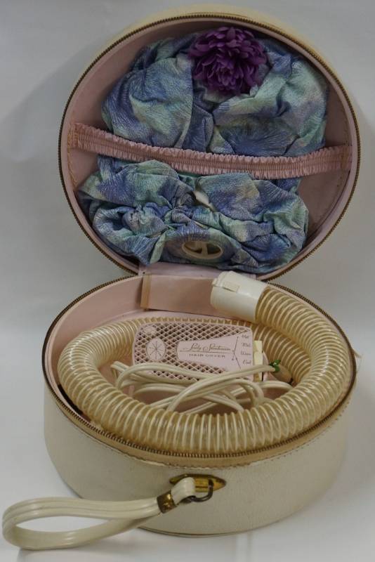 lot 390 image: Vintage Lady Sunbeam Hair Dryer with Vinyl Zippered Case