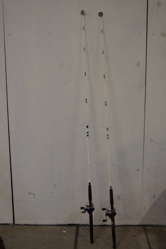 lot 481 image: 2 Catfish Fishing Poles-  Fish On