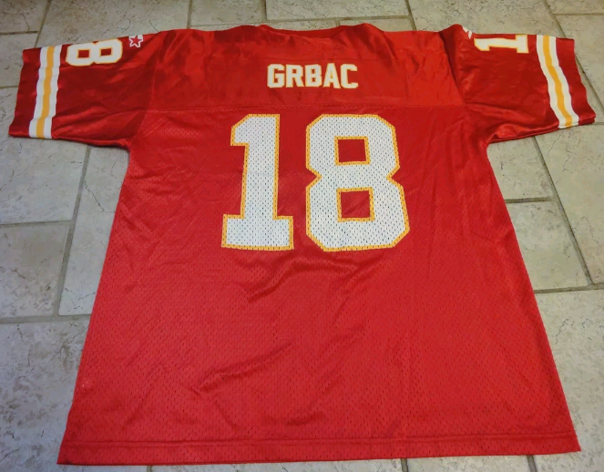 lot 651 image: WOW (    ) Vintage 90s  NFL  Kansas City Chiefs Elvis Grbac #18 Football Jersey
