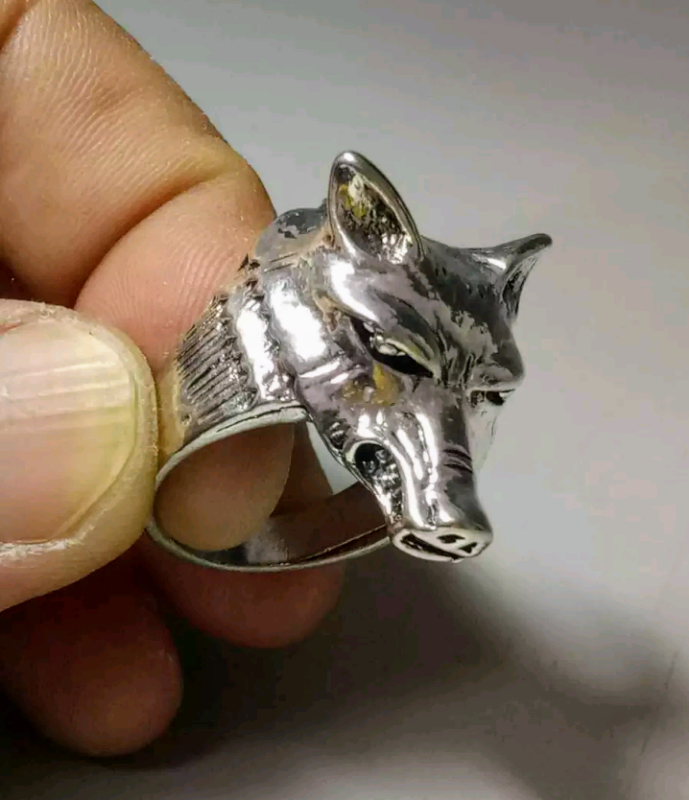 lot 645 image: Chinese Collectible  Tibet Silver Hand Carved  Wolf Head Ring  Size 12