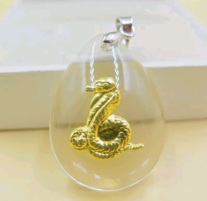 lot 638 image: Handcrafted  24K Yellow Gold  & Crystal Snake Pendant