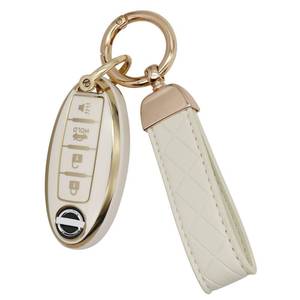 lot 4263 image: SUNCARACCL for Nissan Key Fob Cover with Leather Keychain, Soft TPU Full Protection Key Case Shell for Nissan Altima Maxima Rogue Armada Pathfinder Smart Key 4 Buttons (White)