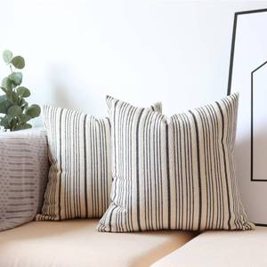 lot 10437 image: NAVIBULE Black Pillow Covers Farmhouse Throw Pillow Covers Outdoor Striped Decorative Square Throw Pillows for Couch Sofa Bed 18x18 in Pack of 2 Black and Cream