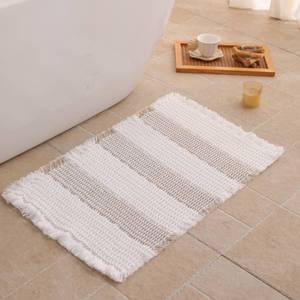lot 4377 image: KaviKon Waffle Bath Mat Non Slip, Boho Bathroom Rug, Super Absorbent Quick Dry Bathroom Mat, Soft Farmhouse Bath Rug with Tassels, Small Washable Shower Mats for Floor 16x24, White and Taupe